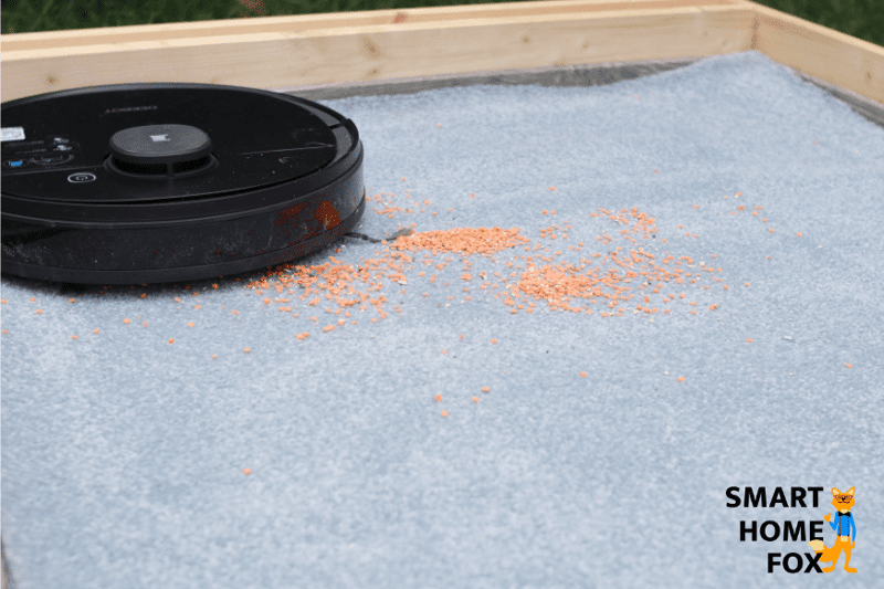 Ecovacs Deebot OZMO 950 пылесосит чечевицу на ковре с высоким ворсом